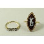 A black cameo and diamond ring, the central lozenge cameo depicting cupid setting his bow,