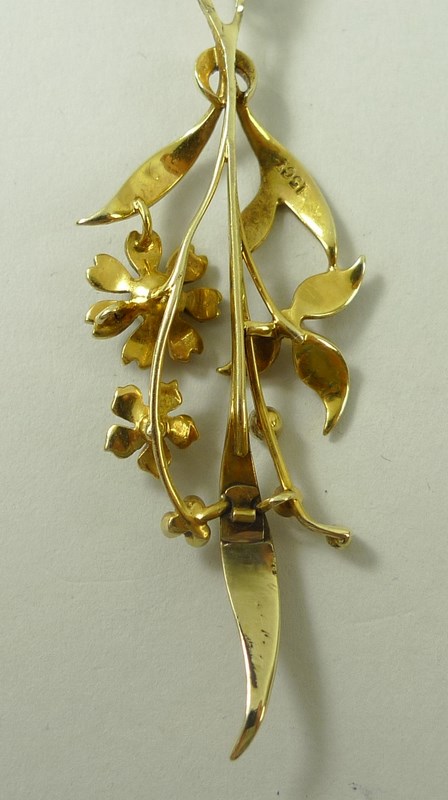 A 15ct gold and seed pearl pendant, formed as a floral corsage of three flowers amongst leaves, 5. - Image 4 of 4