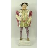 A porcelain figure of Henry VIII, mid 20th century, modelled after Hans Holbein,