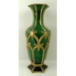 A Bohemian green glass vase, 19th century, with spiral mottled body, gilded,