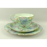 A Shelley part tea service in the Melody pattern, comprising six tea cups, saucers, and tea plates,