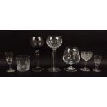 A group of cut glass wares, comprising a set of six cut glass hock glasses,