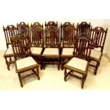 A set six plus six closely similar Victorian oak dining chairs, decorated with carved vine pattern,