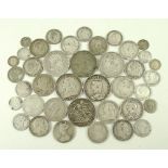 A collection of assorted coins including old and young head crowns, George III crowns,