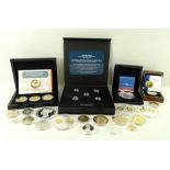 A collection of coins comprising a boxed commemorative five pound coin,