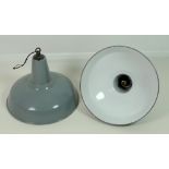 A pair of industrial grey enamel pendant light fittings,