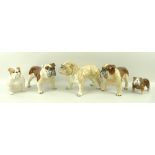 A group of bull dog figures comprising a Beswick seated bull dog,