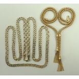 A 9ct gold chain flat link necklace, 77cm, and a 9ct gold necklace with tassel ends,