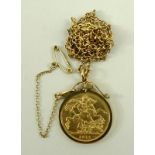 A George V gold sovereign, 1911, set within a 9ct gold pendant mount, with 9ct gold chain, 16.