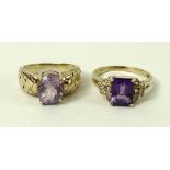 A 9ct gold and amethyst ring, with five diamonds set to each shoulder, size Q,