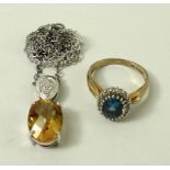 A 9ct, citrine and diamond pendant, and a diamond and sapphire ring, size N.