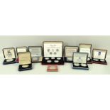 A collection of Royal Mint sterling silver proof coins, cased and mint,