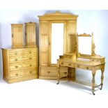 A Victorian light oak bedroom suite, Aesthetic with line carved decoration and brass drop handles,
