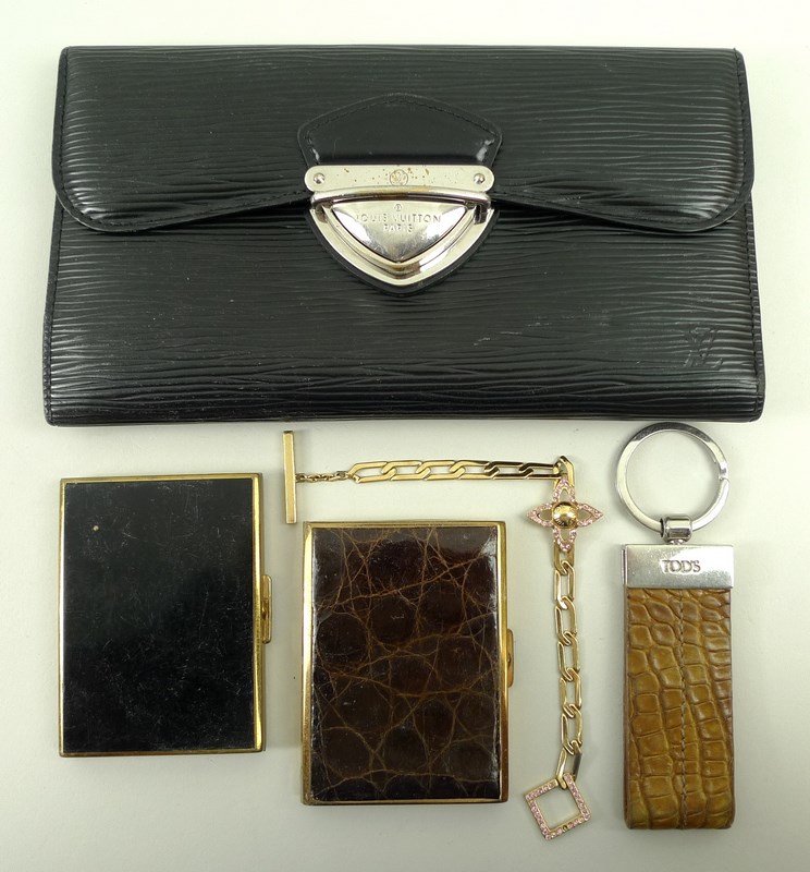 A Louis Vuitton black Epi leather wallet, with grained calf lining, silvered brass lock closure,
