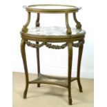 A Victorian giltwood two tier etagere with leaf carving,