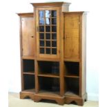 An Aesthetic Movement walnut and satinwood seaweed marquetry inlaid breakfront display cabinet,