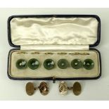 A set of six jade and metal shirt studs, 13mm, in fitted case,