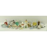 A collection of ceramic figures, comprising a Limoges pepperette, modelled as a Pierrette, 7cm,