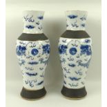 A pair of Chinese blue and white stoneware vases,