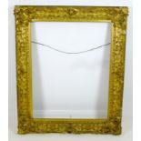 A 19th century gilt composition frame, internal 93 by 72, overall 120 by 98cm.