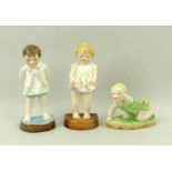 A group of three Royal Worcester figurines comprising 'Tommy', 'Joan' and 'Michael',
