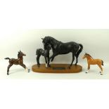 A Beswick figure of Black Beauty and foal, on a wooden base, 21cm, a gloss brown foal,