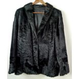 A 1940's fitted black beaver fur jacket with wide sleeves, approximate size 12/14.