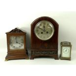 A late Victorian brass carriage clock, the cream dial painted with black Arabic numerals,