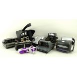 A collection of vintage Polaroid and later cameras including Polatronic 5 1979, 1000SX70 1977,