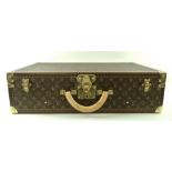 A Louis Vuitton Bisten 65 suitcase (M21325), in monogram coated fabric and calf leather trim,