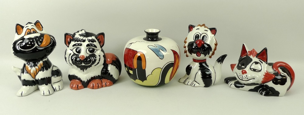 A group of four Lorna Bailey ceramic cats each signed to the base,