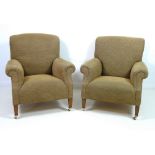 A pair of modern armchairs covered in an olive small green chequered fabric by Kaya Upholstery,