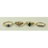 A group of four rings, comprising a 10k crossover with diamond star, size O,
