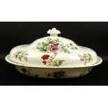 An English porcelain serving dish and cover, early 19th century, of oval form with gadrooned edge,