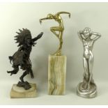 A group of figures, comprising a cast brass figure of a dancing female, on an onyx base, 34cm,