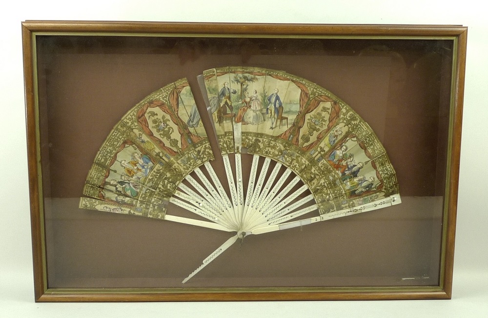 A Georgian fan, 26cm, set in frame, 42 by 65cm.