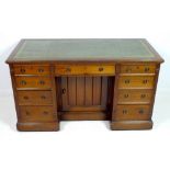 A Victorian mahogany desk, with tooled greed leather surface,