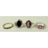 A group of rings, comprising a band set with four diamonds divided by three sapphires, size R,