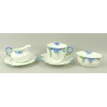 An Aynsley bachelors tea set, decorated with blue flowers, with moulded handles,