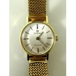 An Omega Geneve lady's wristwatch, circa 1970, the circular face with baton numerals,