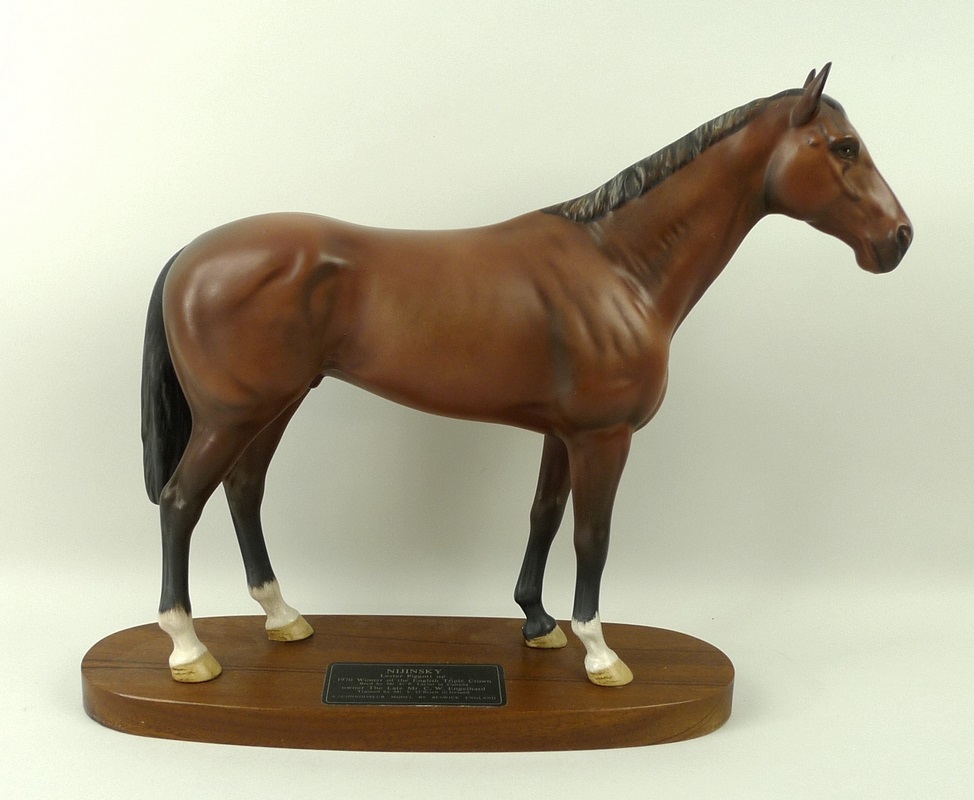 A Beswick equine figurine of 'Nijinsky', on an oval wooden base, 28cm.