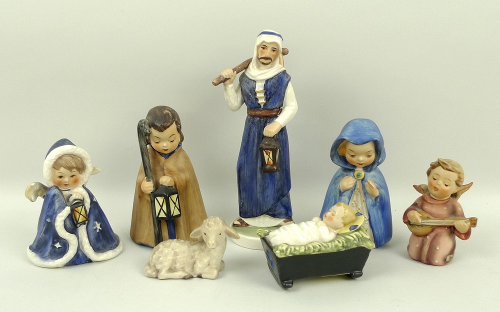 A Hummel Nativity set of seven pieces comprising Joseph, 17cm, Mary, 10cm, baby Jesus in crib,