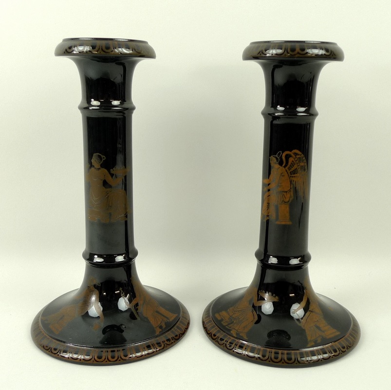 A pair of Samuel Alcock & Co candlesticks, circa 1840, in the Greek style,