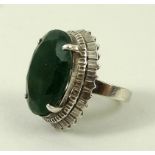 A white gold and emerald ring, circa 1956, marked 18k, made in Vietnam, Ho Chimin/Saigon,