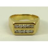 A gentleman's 18ct gold and diamond ring,