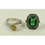 A 9ct white gold and emerald ring,