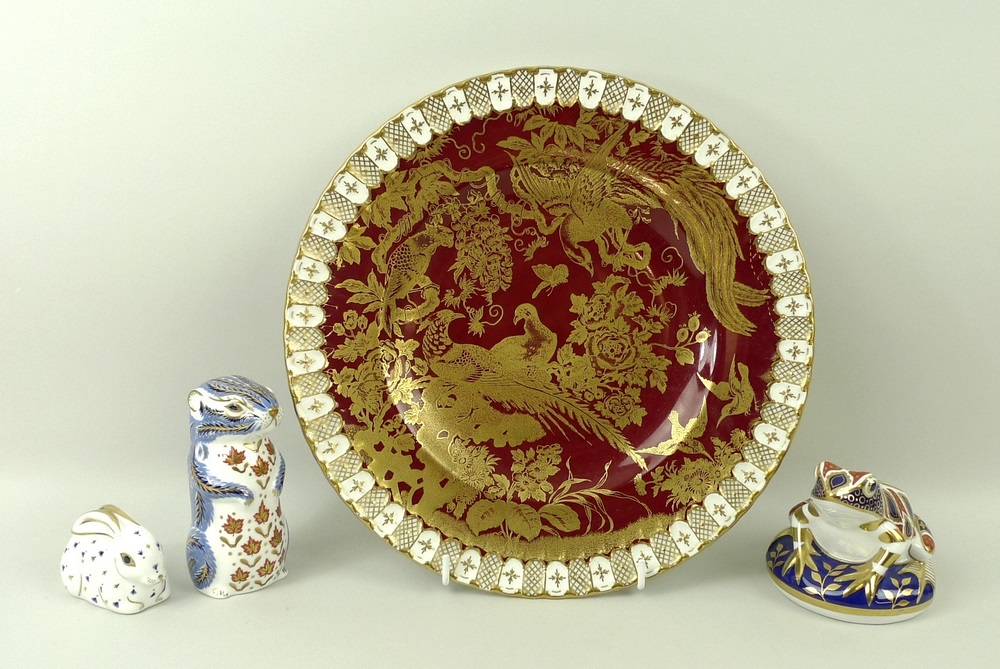 A collection of Royal Crown Derby paperweights, comprising a frog/toad, rabbit, and chipmunk,