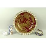 A collection of Royal Crown Derby paperweights, comprising a frog/toad, rabbit, and chipmunk,