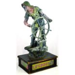 ﻿LIFEBUOY ADVERTISING FIGURE. 24.5ins tall, large spelter figure of a sailor holding ships wheel