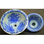 PAIR OF HAND WASH BOWLS. One with blue & white floral design interior, the other pictorial